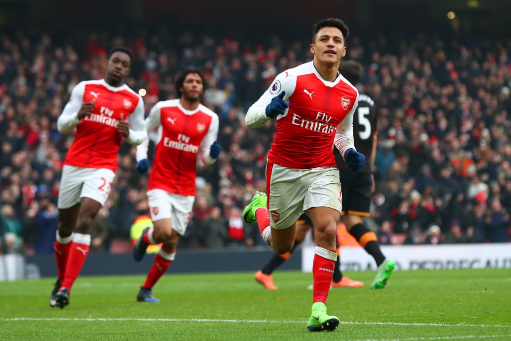 LONDON, ENGLAND - FEBRUARY 11: Alexis Sanchez of Arsenal celebrates scoring his side's second goal from the penalty spot during the Premier League match between Arsenal and Hull City at Emirates Stadium on February 11, 2017 in London, England. (Photo by Clive Rose/Getty Images)