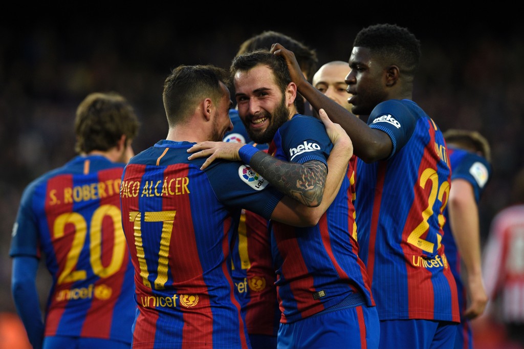 CORRECTION - Barcelona's defender Aleix Vidal (C) celebrates with teammates after scoring a goal during the Spanish league football match FC Barcelona vs Athletic Club Bilbao at the Camp Nou stadium in Barcelona on February 4, 2017. / AFP / LLUIS GENE / The erroneous mention[s] appearing in the metadata of this photo by LLUIS GENE has been modified in AFP systems in the following manner: [Barcelona's defender Aleix Vidal (C)] instead of [Barcelona's forward Paco Alcacer (2L)]. Please immediately remove the erroneous mention[s] from all your online services and delete it (them) from your servers. If you have been authorized by AFP to distribute it (them) to third parties, please ensure that the same actions are carried out by them. Failure to promptly comply with these instructions will entail liability on your part for any continued or post notification usage. Therefore we thank you very much for all your attention and prompt action. We are sorry for the inconvenience this notification may cause and remain at your disposal for any further information you may require. (Photo credit should read LLUIS GENE/AFP/Getty Images)