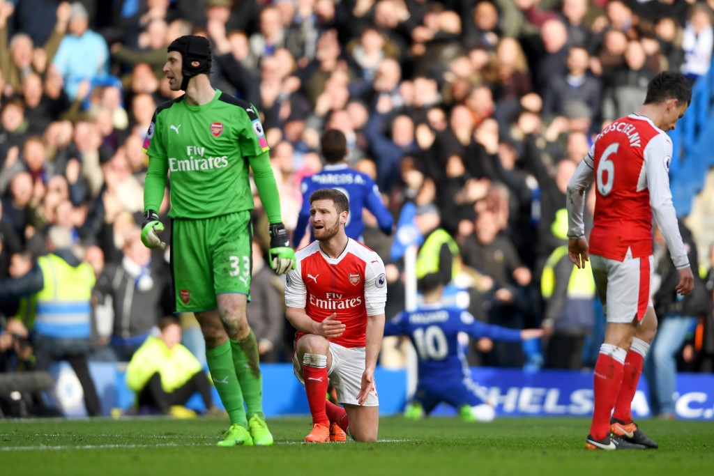 LONDON, ENGLAND - FEBRUARY 04: Petr Cech and Shkodran Mustafi of Arsenal react after conceding a second goal scored by Eden Hazard of Chelsea during the Premier League match between Chelsea and Arsenal at Stamford Bridge on February 4, 2017 in London, England. (Photo by Mike Hewitt/Getty Images)
