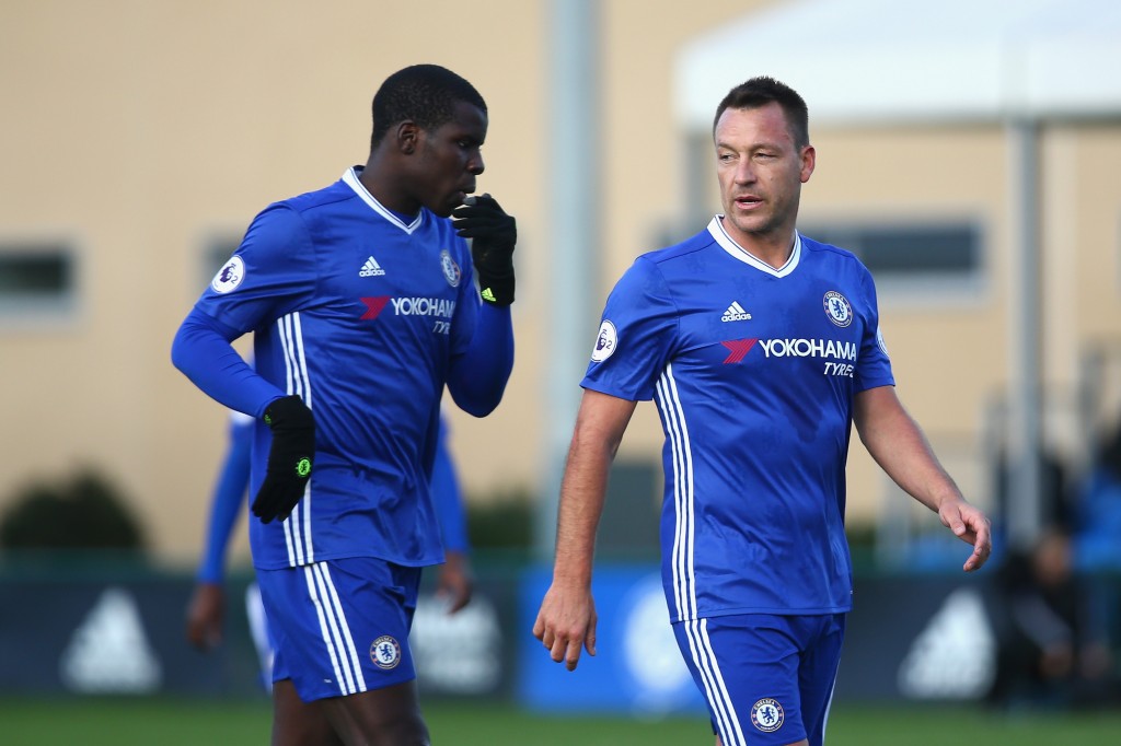 COBHAM, ENGLAND - NOVEMBER 21: Kurt Zouma of Chelsea (L) and John Terry (R) speak during the Premier League 2 match between Chelsea and Southampton at Chelsea Training Ground on November 21, 2016 in Cobham, England. (Photo by Alex Pantling/Getty Images)