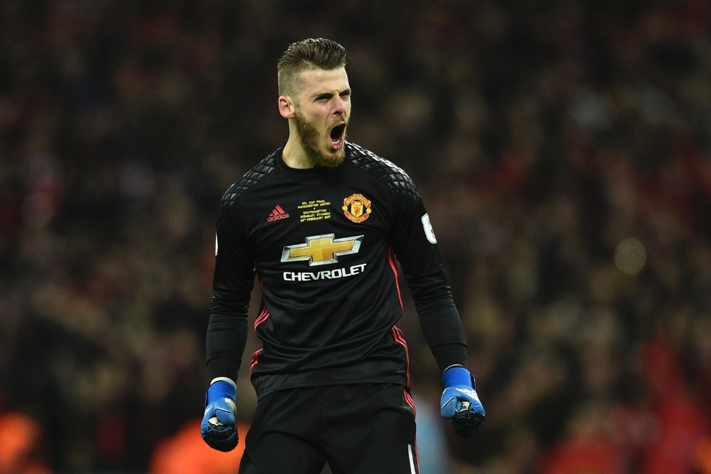 Manchester United's Spanish goalkeeper David de Gea celebrates at the final whistle in the English League Cup final football match between Manchester United and Southampton at Wembley stadium in north London on February 26, 2017. Manchester United won the game 3-2. / AFP / Glyn KIRK / RESTRICTED TO EDITORIAL USE. No use with unauthorized audio, video, data, fixture lists, club/league logos or 'live' services. Online in-match use limited to 75 images, no video emulation. No use in betting, games or single club/league/player publications. / (Photo credit should read GLYN KIRK/AFP/Getty Images)