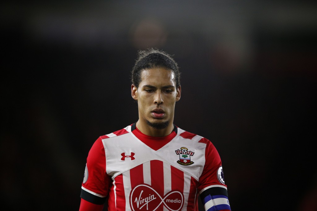 Southampton's Dutch defender Virgil van Dijk reacts during the EFL (English Football League) Cup semi-final first-leg football match between Southampton and Liverpool at St Mary's Stadium in Southampton, southern England on January 11, 2017. / AFP / Adrian DENNIS / RESTRICTED TO EDITORIAL USE. No use with unauthorized audio, video, data, fixture lists, club/league logos or 'live' services. Online in-match use limited to 75 images, no video emulation. No use in betting, games or single club/league/player publications. / (Photo credit should read ADRIAN DENNIS/AFP/Getty Images)