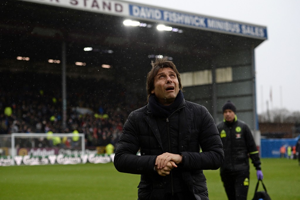 Chelsea's Italian head coach Antonio Conte arrives for the English Premier League football match between Burnley and Chelsea at Turf Moor in Burnley, north west England on February 12, 2017. / AFP / Oli SCARFF / RESTRICTED TO EDITORIAL USE. No use with unauthorized audio, video, data, fixture lists, club/league logos or 'live' services. Online in-match use limited to 75 images, no video emulation. No use in betting, games or single club/league/player publications. / (Photo credit should read OLI SCARFF/AFP/Getty Images)