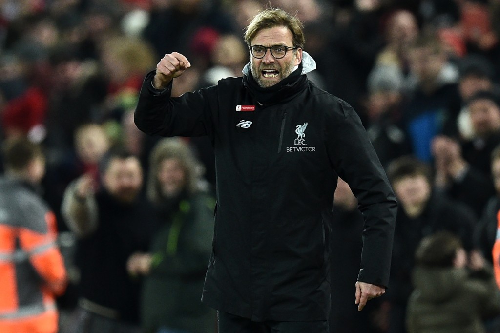 Liverpool's German manager Jurgen Klopp gestures on the touchline during the English Premier League football match between Liverpool and Tottenham Hotspur at Anfield in Liverpool, north west England on February 11, 2017. / AFP / Oli SCARFF / RESTRICTED TO EDITORIAL USE. No use with unauthorized audio, video, data, fixture lists, club/league logos or 'live' services. Online in-match use limited to 75 images, no video emulation. No use in betting, games or single club/league/player publications. / (Photo credit should read OLI SCARFF/AFP/Getty Images)