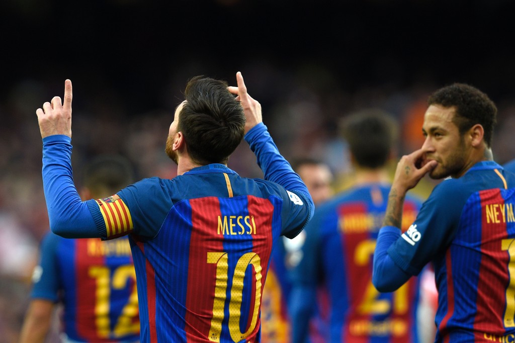 Barcelona's Argentinian forward Lionel Messi (L) celebrates beside Barcelona's Brazilian forward Neymar (R) after scoring a goal during the Spanish league football match FC Barcelona vs Athletic Club Bilbao at the Camp Nou stadium in Barcelona on February 4, 2017. / AFP / LLUIS GENE (Photo credit should read LLUIS GENE/AFP/Getty Images)