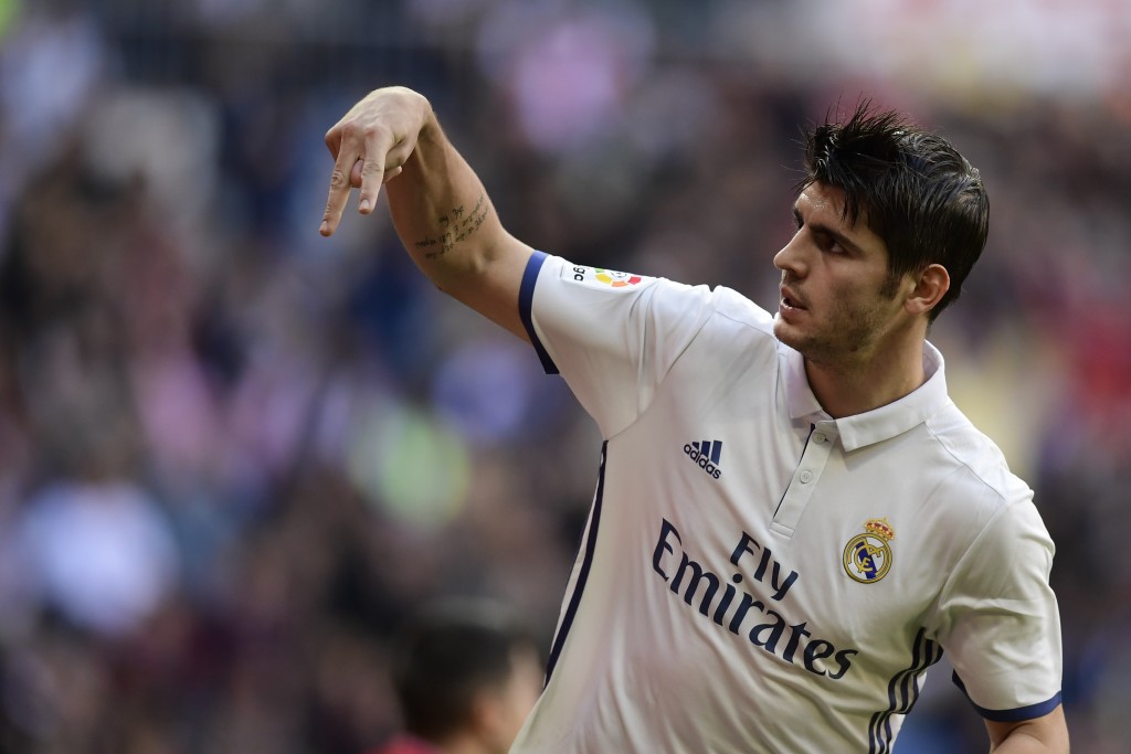 Real Madrid's forward Alvaro Morata celebrates after scoring a goal during the Spanish league football match Real Madrid CF vs Club Deportivo Leganes SAD at the Santiago Bernabeu stadium in Madrid on November 6, 2016. / AFP / JAVIER SORIANO (Photo credit should read JAVIER SORIANO/AFP/Getty Images)