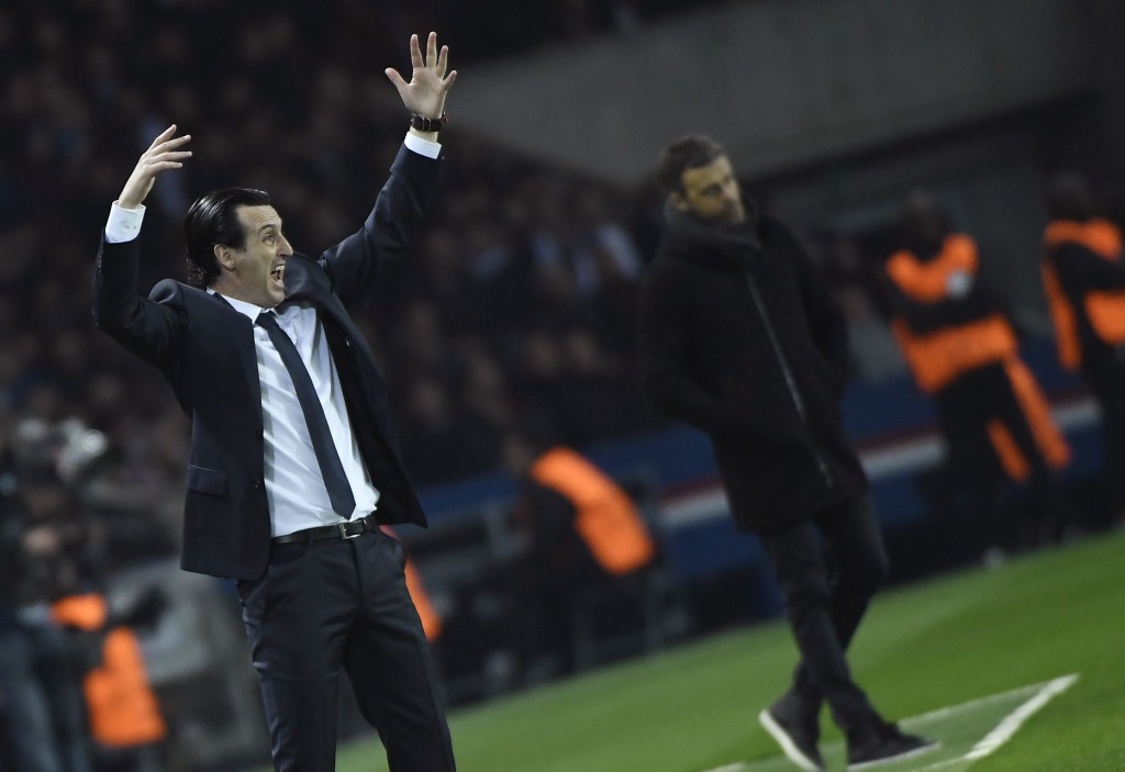 Paris Saint-Germain's Spanish headcoach Unai Emery (L) reacts during the UEFA Champions League round of 16 first leg football match between Paris Saint-Germain and FC Barcelona on February 14, 2017 at the Parc des Princes stadium in Paris. / AFP / Lionel BONAVENTURE (Photo credit should read LIONEL BONAVENTURE/AFP/Getty Images)