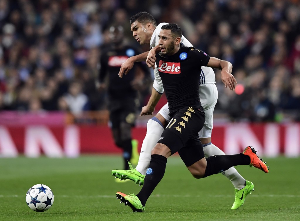 Napoli's defender from Algeria Faouzi Ghoulam (R) vies with Real Madrid's Brazilian midfielder Casemiro during the UEFA Champions League round of 16 first leg football match Real Madrid CF vs SSC Napoli at the Santiago Bernabeu stadium in Madrid on February 15, 2017. / AFP / JAVIER SORIANO (Photo credit should read JAVIER SORIANO/AFP/Getty Images)