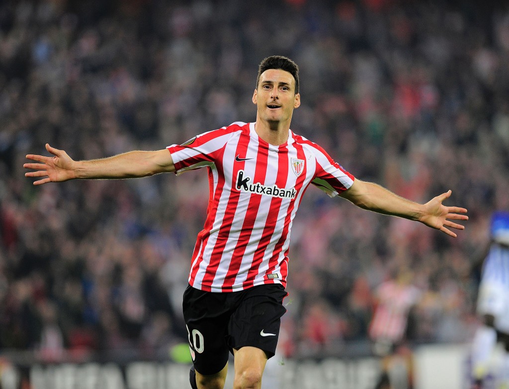 Athletic Bilbao's forward Aritz Aduriz celebrates after scoring his team's fourth goal during the Europa League Group F football match Athletic Club de Bilbao vs KRC Genk at the San Mames stadium in Bilbao on November 3, 2016. / AFP / ANDER GILLENEA (Photo credit should read ANDER GILLENEA/AFP/Getty Images)