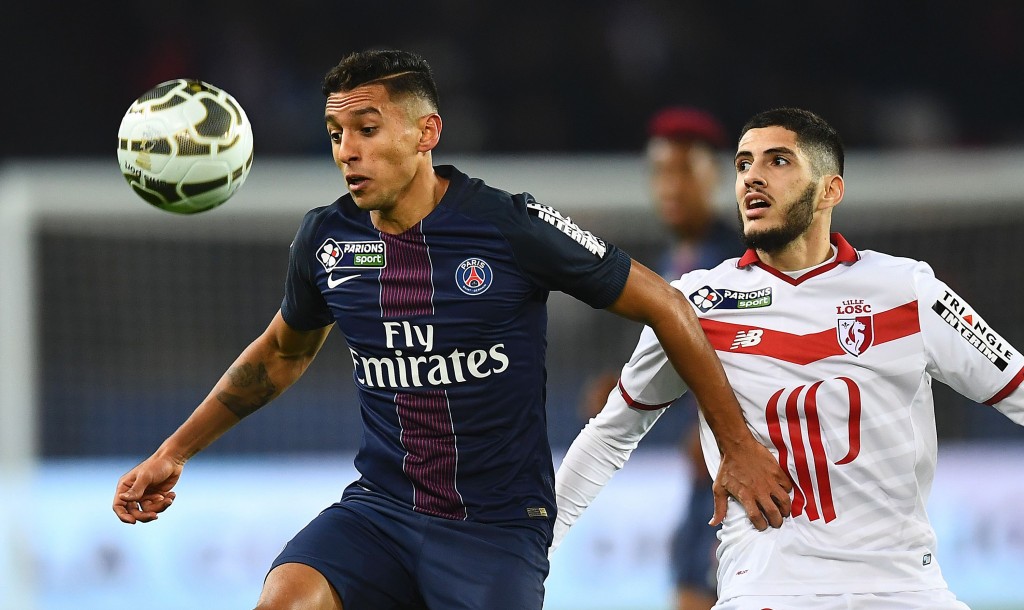 Paris Saint-Germain's Brazilian defender Marquinhos (L) controls the ball next to Lille's French forward Yassine Benzia during the French League Cup football match between Paris Saint-Germain and Lille at the Parc des Princes stadium in Paris on December 14, 2016. / AFP / FRANCK FIFE (Photo credit should read FRANCK FIFE/AFP/Getty Images)