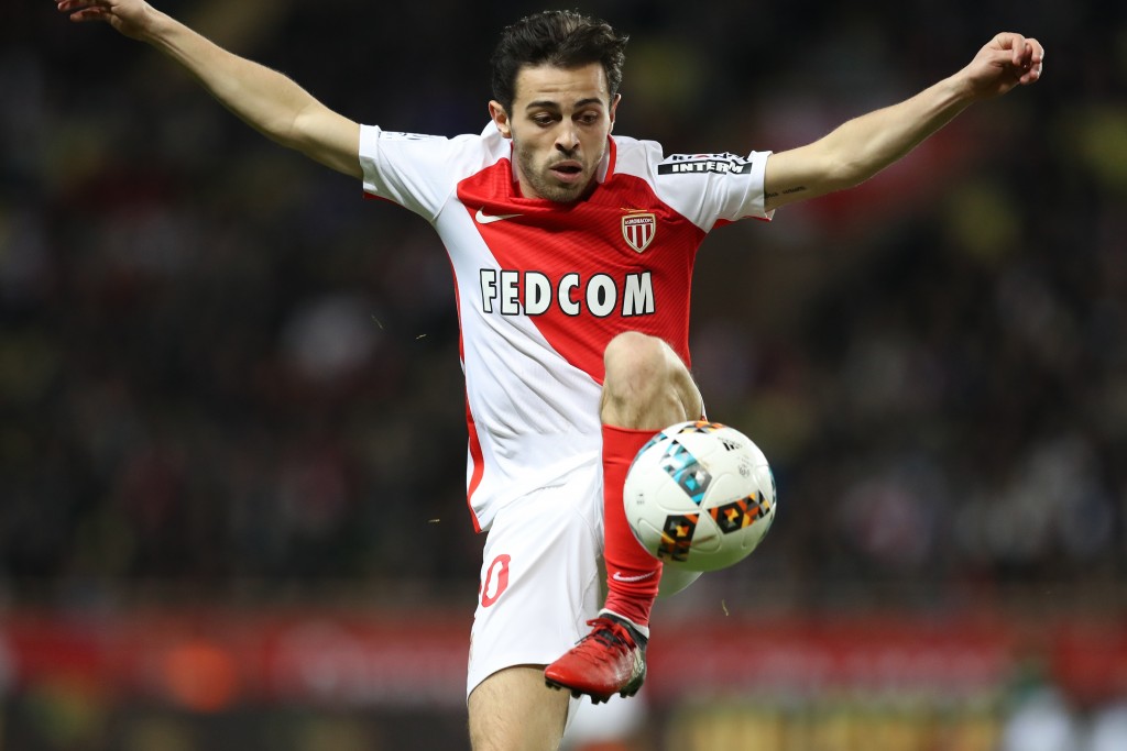 Making a mark. (Photo courtesy - Valery Hache/AFP/Getty Images)