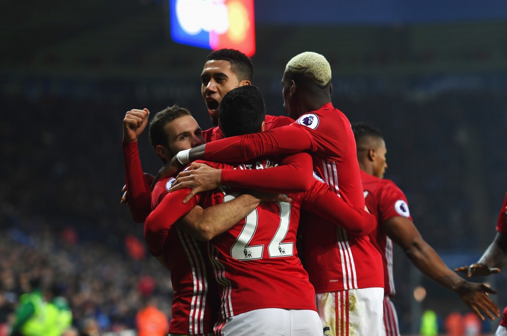 LEICESTER, ENGLAND - FEBRUARY 05: Juan Mata of Manchester United (L) celebrates with team mates as he scores their third goal during the Premier League match between Leicester City and Manchester United at The King Power Stadium on February 5, 2017 in Leicester, England. (Photo by Shaun Botterill/Getty Images)