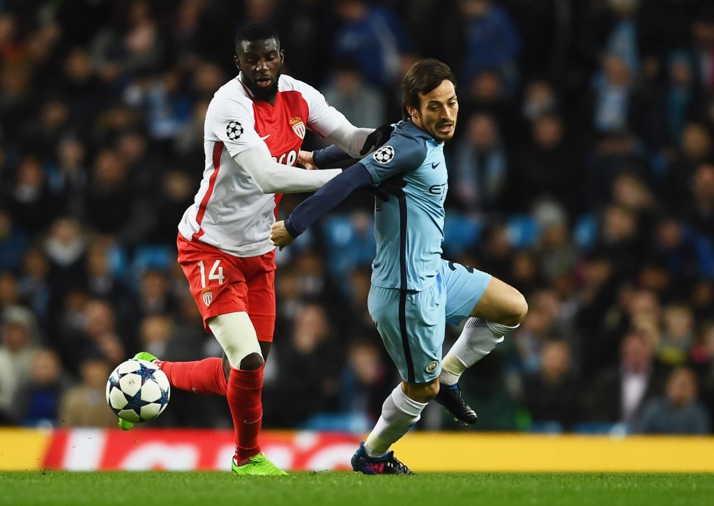 MANCHESTER, ENGLAND - FEBRUARY 21: David Silva of Manchester City battles with Tiemoue Bakayoko of AS Monaco during the UEFA Champions League Round of 16 first leg match between Manchester City FC and AS Monaco at Etihad Stadium on February 21, 2017 in Manchester, United Kingdom. (Photo by Laurence Griffiths/Getty Images)