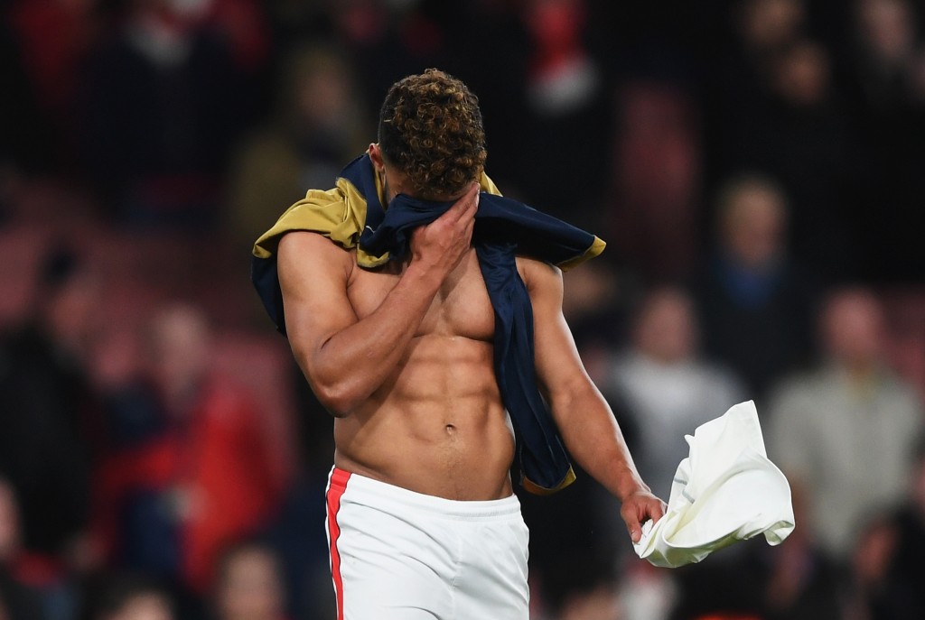LONDON, ENGLAND - MARCH 07: Alex Oxlade-Chamberlain of Arsenal looks dejected in defeat after the UEFA Champions League Round of 16 second leg match between Arsenal FC and FC Bayern Muenchen at Emirates Stadium on March 7, 2017 in London, United Kingdom. (Photo by Shaun Botterill/Getty Images)