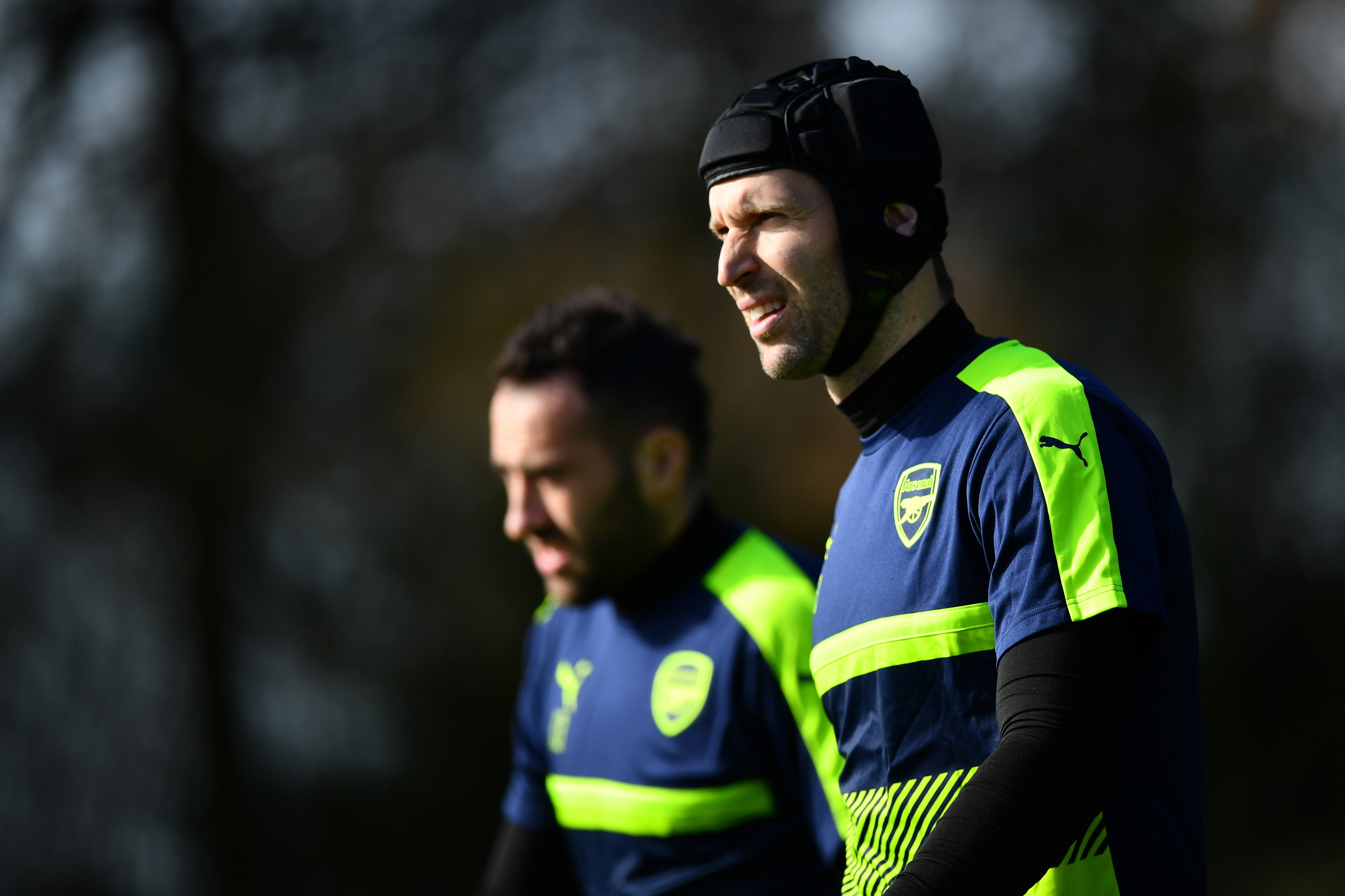 ST ALBANS, ENGLAND - MARCH 06: (R-L) Arsenal goalkeepers Petr Cech and David Ospina arrive prior to the Arsenal traing session at London Colney on March 6, 2017 in St Albans, England. (Photo by Dan Mullan/Getty Images)