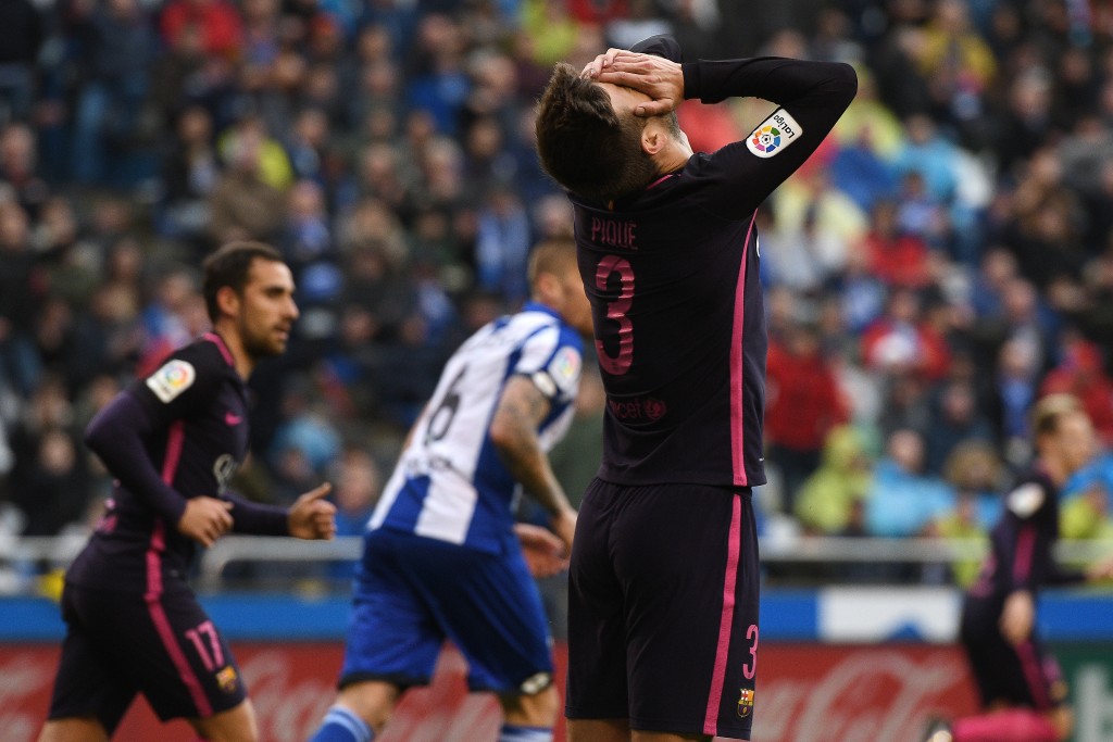 LA CORUNA, SPAIN - MARCH 12: Gerard Pique of FC Barcelona reacts after missing a goal opportunity during the La Liga match between RC Deportivo La Coruna and FC Barcelona at Riazor Stadium on March 12, 2017 in La Coruna, Spain. (Photo by Octavio Passos/Getty Images)
