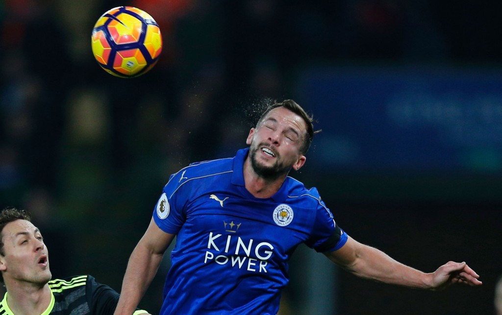 Leicester City's English midfielder Danny Drinkwater (R) wins a header as Chelsea's Spanish defender Marcos Alonso and Chelsea's Serbian midfielder Nemanja Matic (C) look on during the English Premier League football match between Leicester City and Chelsea at King Power Stadium in Leicester, central England on January 14, 2017. / AFP / Adrian DENNIS / RESTRICTED TO EDITORIAL USE. No use with unauthorized audio, video, data, fixture lists, club/league logos or 'live' services. Online in-match use limited to 75 images, no video emulation. No use in betting, games or single club/league/player publications. / (Photo credit should read ADRIAN DENNIS/AFP/Getty Images)