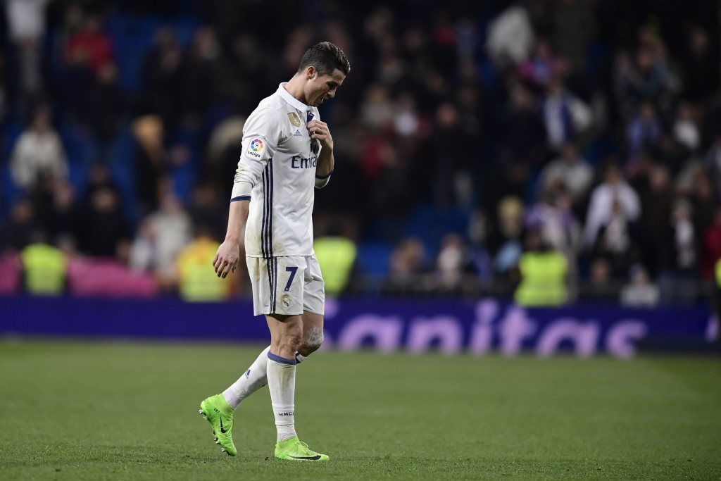 Real Madrid's Portuguese forward Cristiano Ronaldo leaves the pitch at the end of the Spanish league football match Real Madrid CF vs UD Las Palmas at the Santiago Bernabeu stadium in Madrid on March 1, 2017. / AFP PHOTO / JAVIER SORIANO (Photo credit should read JAVIER SORIANO/AFP/Getty Images)