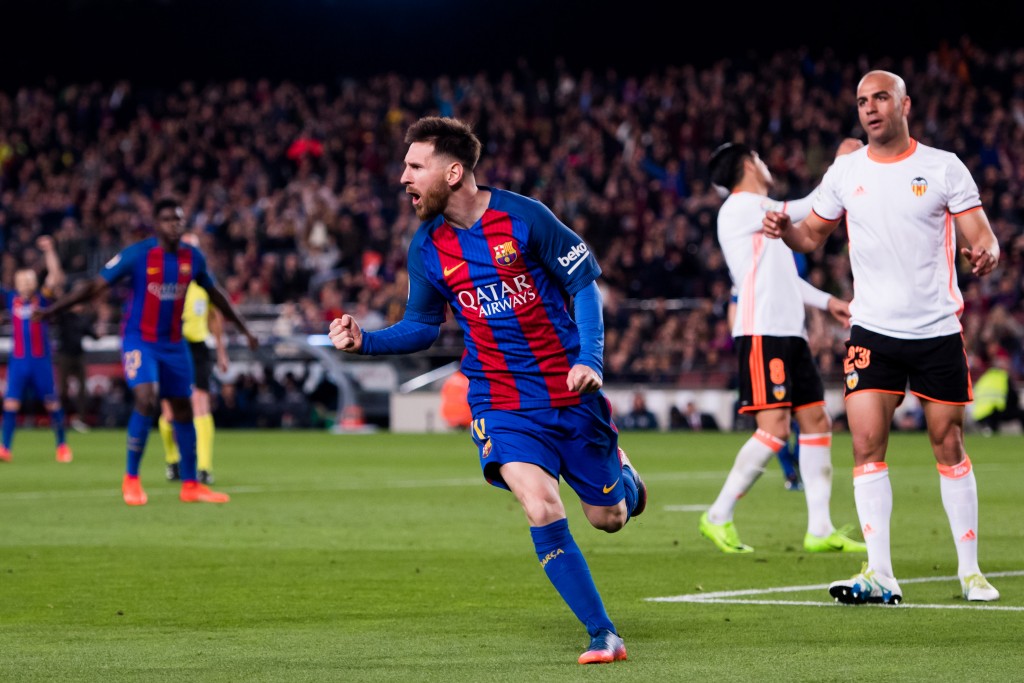 BARCELONA, SPAIN - MARCH 19: Lionel Messi of FC Barcelona celebrates after scoring his team's third goal during the La Liga match between FC Barcelona and Valencia CF at Camp Nou stadium on March 19, 2017 in Barcelona, Spain. (Photo by Alex Caparros/Getty Images)