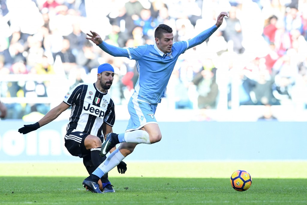 TURIN, ITALY - JANUARY 22: Sami Khedira (L) of Juventus FC tackles Sergej Milinkovic of SS Lazio during the Serie A match between Juventus FC and SS Lazio at Juventus Stadium on January 22, 2017 in Turin, Italy. (Photo by Valerio Pennicino/Getty Images)