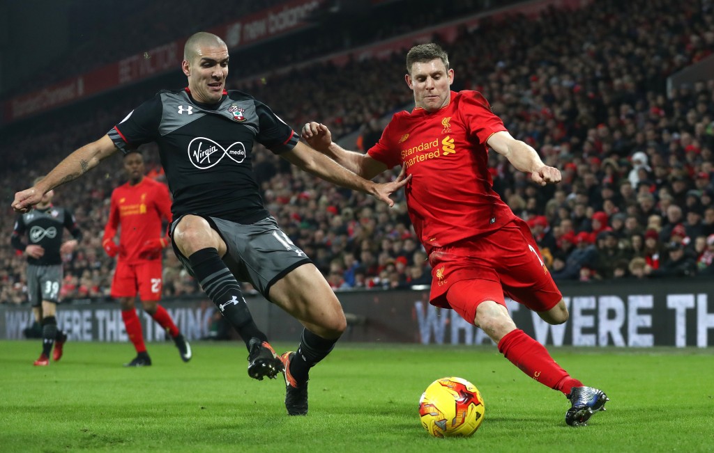 LIVERPOOL, ENGLAND - JANUARY 25: Oriol Romeu of Southampton makes a challenge on James Milner of Liverpool during the EFL Cup Semi-Final Second Leg match between Liverpool and Southampton at Anfield on January 25, 2017 in Liverpool, England. (Photo by Julian Finney/Getty Images)