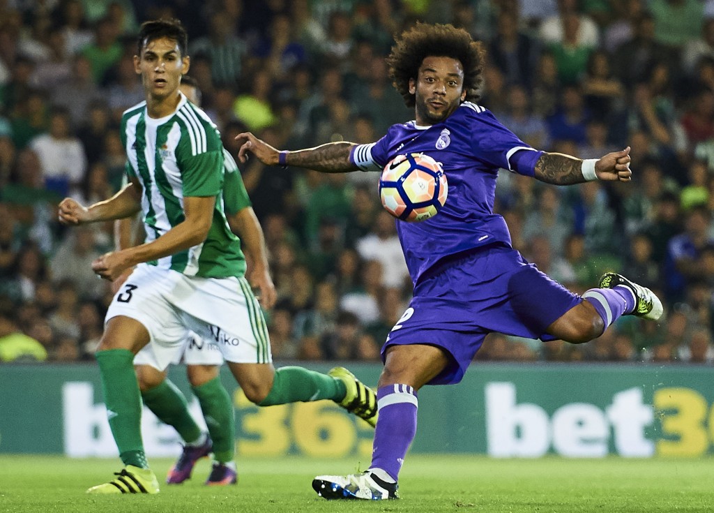 SEVILLE, SPAIN - OCTOBER 15: Marcelo of Real Madrid CF shoots for score a goal during the match between Real Betis Balompie and Real Madrid CF as part of La Liga at Benito Villamrin stadium October 15, 2016 in Seville, Spain. (Photo by Aitor Alcalde/Getty Images)