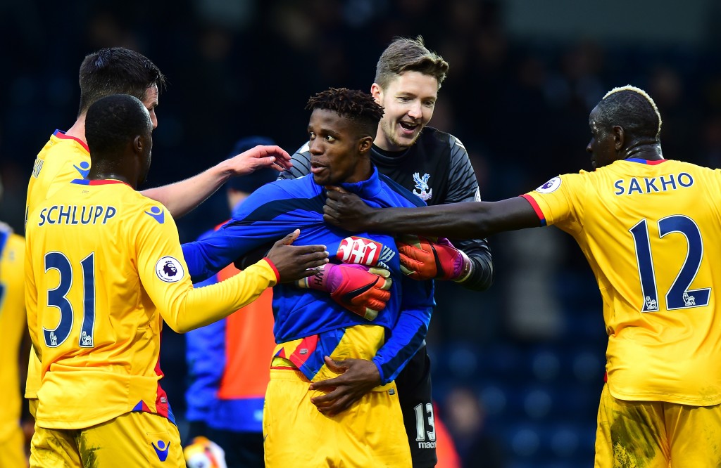 WEST BROMWICH, ENGLAND - MARCH 04: Wilfried Zaha of Crystal Palace celebrates with his Crystal Palace team mates after the Premier League match between West Bromwich Albion and Crystal Palace at The Hawthorns on March 4, 2017 in West Bromwich, England. (Photo by Tony Marshall/Getty Images)