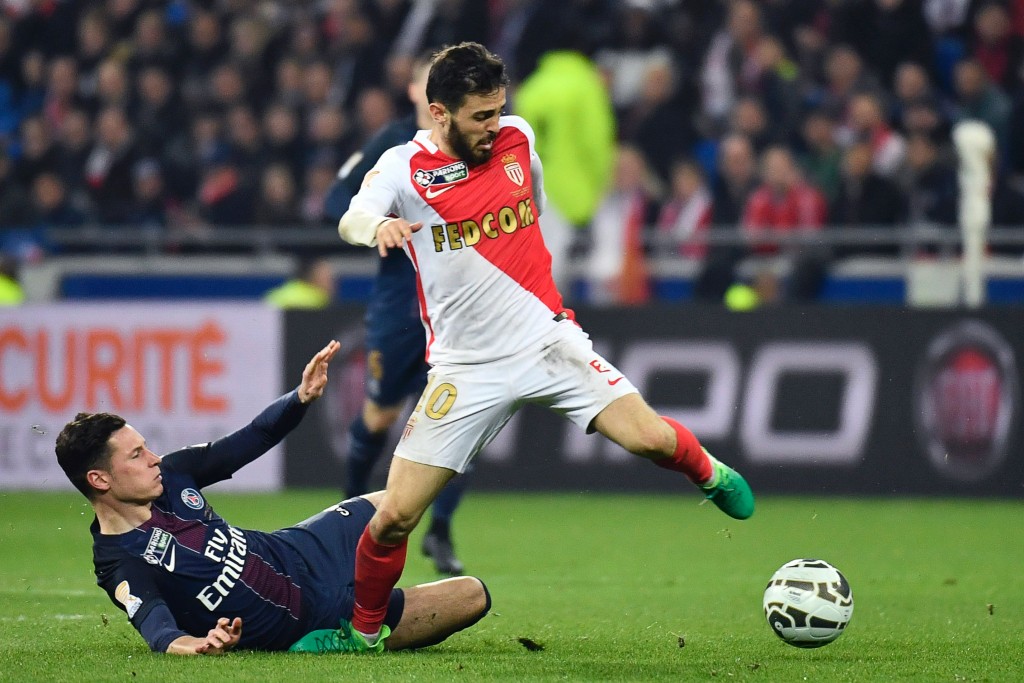 Monaco's Portuguese midfielder Bernardo Silva (R) vies for the ball with Paris Saint-Germain's German forward Julian Draxler during the French League Cup final football match between Paris Saint-Germain (PSG) and Monaco (ASM) on April 1, 2017, at the Parc Olympique Lyonnais stadium in Decines-Charpieu, near Lyon. / AFP PHOTO / Jeff PACHOUD        (Photo credit should read JEFF PACHOUD/AFP/Getty Images)
