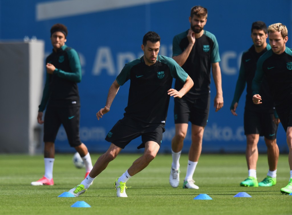 BARCELONA, SPAIN - APRIL 18: Sergio Busquets of Barcelona takes part in a drill with team mates during a FC Barcelona training session on the eve of their UEFA Champions League quarter final second leg match against Juventus at FC Barcelona Sports Centre on April 18, 2017 in Barcelona, Spain. (Photo by David Ramos/Getty Images)
