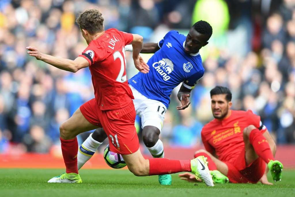LIVERPOOL, ENGLAND - APRIL 01: Lucas Leiva of Liverpool (L) and Idrissa Gueye of Everton (R) battle for possession during the Premier League match between Liverpool and Everton at Anfield on April 1, 2017 in Liverpool, England. (Photo by Gareth Copley/Getty Images)