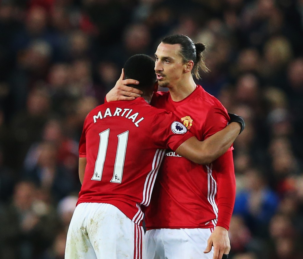 MANCHESTER, ENGLAND - DECEMBER 31: Anthony Martial of Manchester United celebrates after he scores a goal with team mate Zlatan Ibrahimovic during the Premier League match between Manchester United and Middlesbrough at Old Trafford on December 31, 2016 in Manchester, England. (Photo by Alex Livesey/Getty Images)