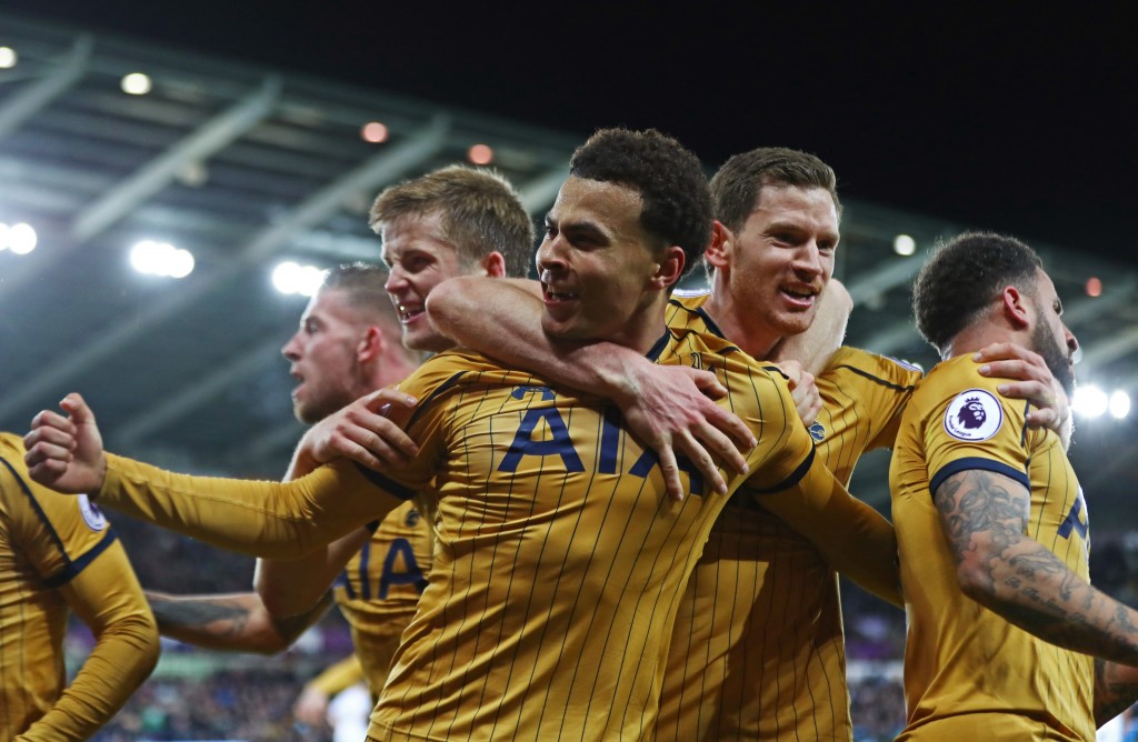 SWANSEA, WALES - APRIL 05: Dele Alli of Tottenham Hotspur celebrates scoring his sides first goal with his Tottenham Hotspur team mates during the Premier League match between Swansea City and Tottenham Hotspur at the Liberty Stadium on April 5, 2017 in Swansea, Wales. (Photo by Michael Steele/Getty Images)