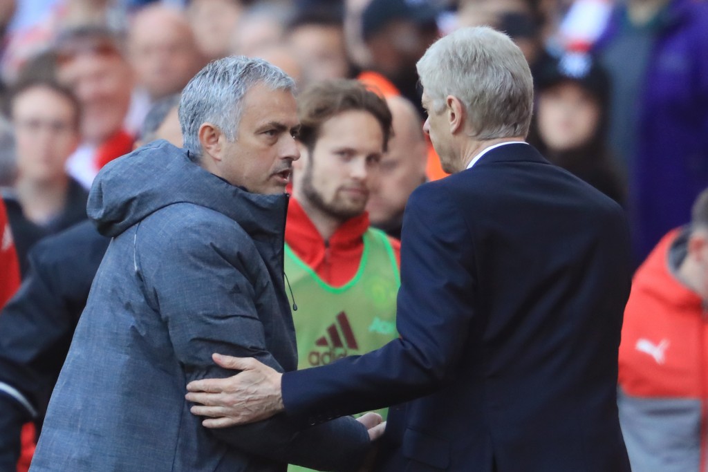 LONDON, ENGLAND - MAY 07: Jose Mourinho, Manager of Manchester United and Arsene Wenger, Manager of Arsenal shake hands after the Premier League match between Arsenal and Manchester United at the Emirates Stadium on May 7, 2017 in London, England. (Photo by Richard Heathcote/Getty Images)