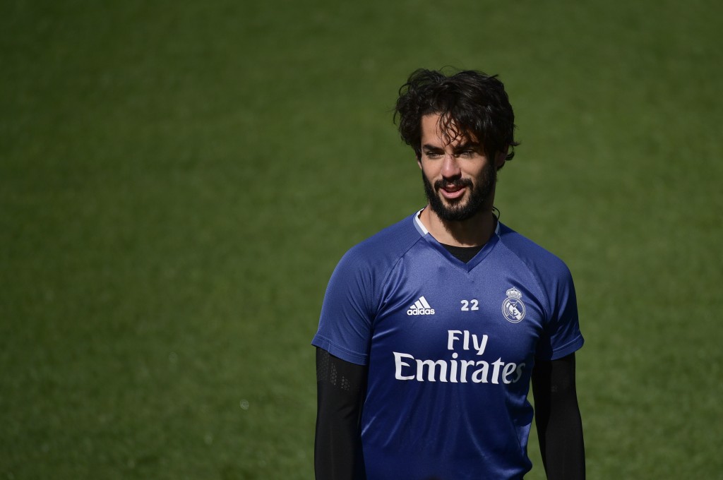 Real Madrid's midfielder Isco attends a training session at Valdebebas Sport City in Madrid on April 28, 2017 on the eve of their Liga football match against Valencia. / AFP PHOTO / PIERRE-PHILIPPE MARCOU (Photo credit should read PIERRE-PHILIPPE MARCOU/AFP/Getty Images)