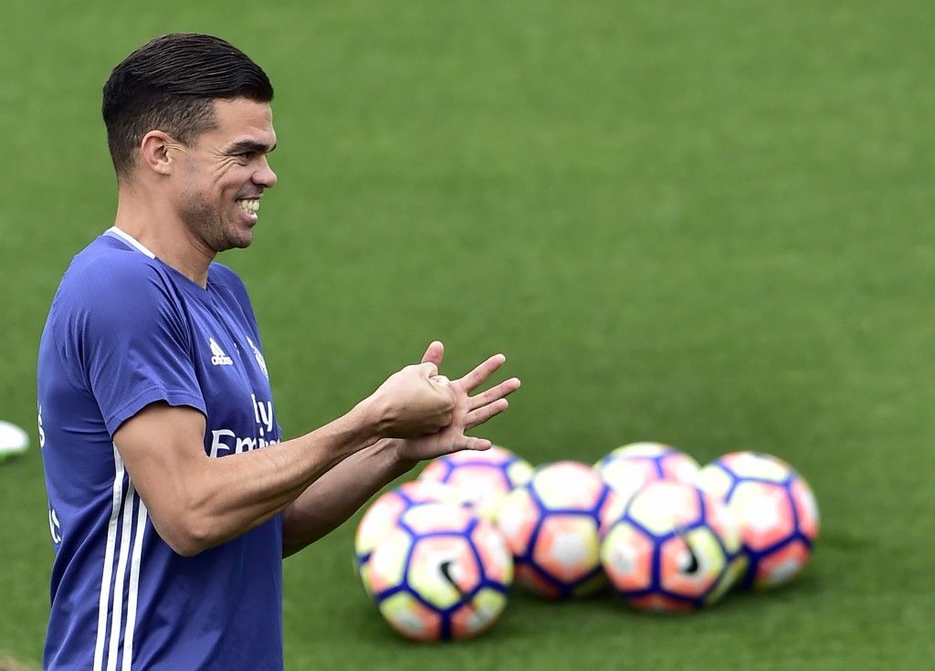 Real Madrid's Portuguese defender Pepe smiles during a training session at Valdebebas training ground in Madrid on May 5, 2017, on the eve of the Spanish League match football match Granada CF vs Real Madrid CF. / AFP PHOTO / GERARD JULIEN (Photo credit should read GERARD JULIEN/AFP/Getty Images)