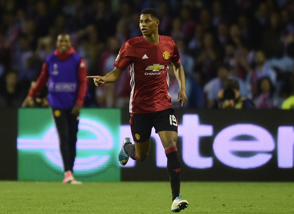 Manchester United's forward Marcus Rashford celebrates after scoring the opener during their UEFA Europa League semi final first leg football match RC Celta de Vigo vs Manchester United FC at the Balaidos stadium in Vigo on May 4, 2017. Manchester won 1-0. / AFP PHOTO / MIGUEL RIOPA (Photo credit should read MIGUEL RIOPA/AFP/Getty Images)
