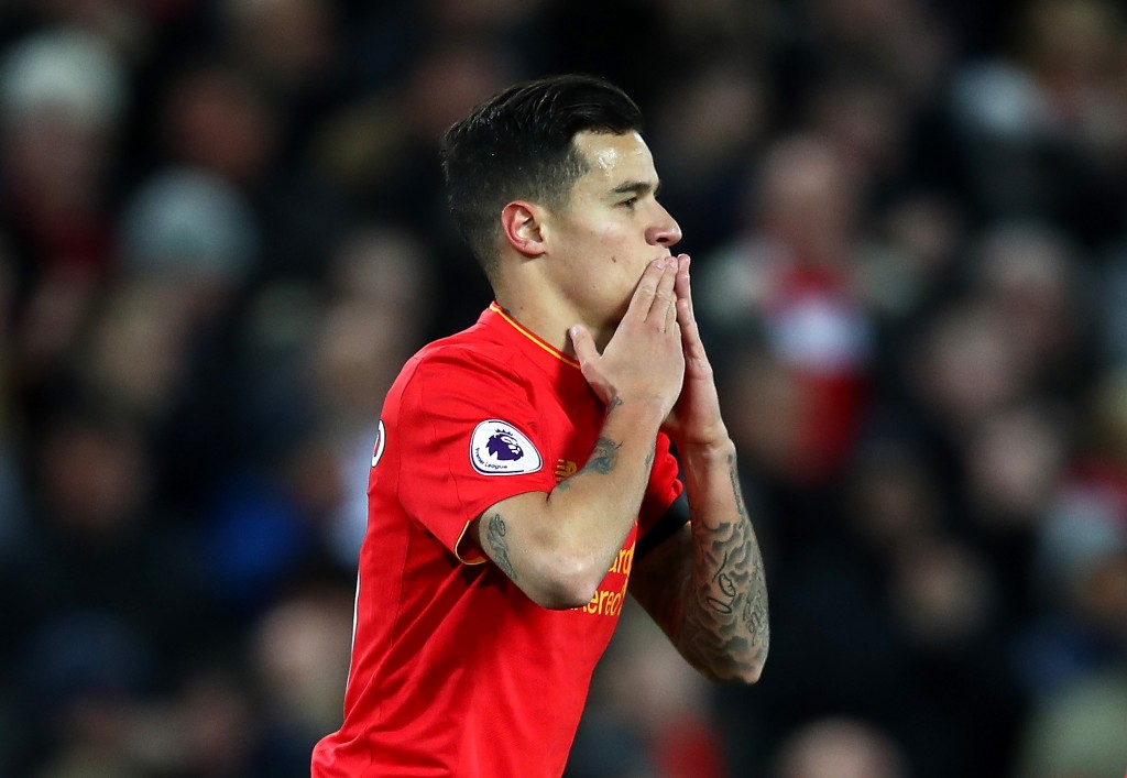 LIVERPOOL, ENGLAND - APRIL 05: Philippe Coutinho of Liverpool celebrates scoring his sides first goal during the Premier League match between Liverpool and AFC Bournemouth at Anfield on April 5, 2017 in Liverpool, England. (Photo by Clive Brunskill/Getty Images)