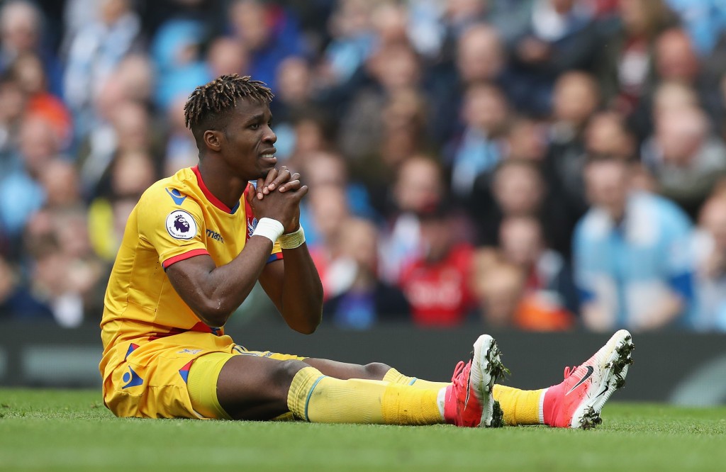 MANCHESTER, ENGLAND - MAY 06: Wilfried Zaha of Crystal Palace reacts during the Premier League match between Manchester City and Crystal Palace at the Etihad Stadium on May 6, 2017 in Manchester, England. (Photo by Mark Robinson/Getty Images)