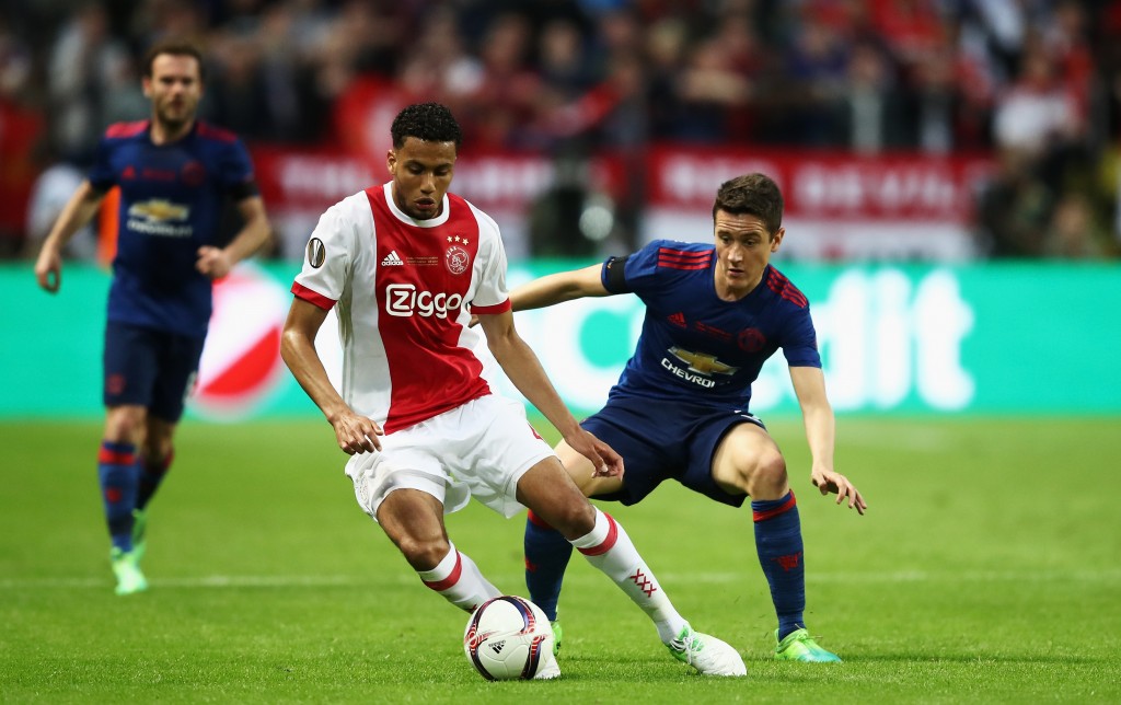 STOCKHOLM, SWEDEN - MAY 24: Jaïro Riedewald of Ajax and Ander Herrera of Manchester United in action during the UEFA Europa League Final between Ajax and Manchester United at Friends Arena on May 24, 2017 in Stockholm, Sweden. (Photo by Julian Finney/Getty Images)
