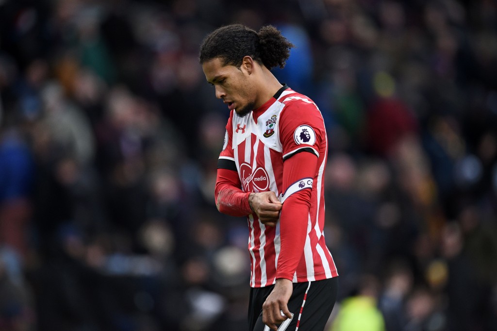 Southampton's Dutch defender Virgil van Dijk walks from the pitch at half time in the English Premier League football match between Burnley and Southampton at Turf Moor in Burnley, north west England on January 14, 2017. / AFP / Oli SCARFF / RESTRICTED TO EDITORIAL USE. No use with unauthorized audio, video, data, fixture lists, club/league logos or 'live' services. Online in-match use limited to 75 images, no video emulation. No use in betting, games or single club/league/player publications. / (Photo credit should read OLI SCARFF/AFP/Getty Images)