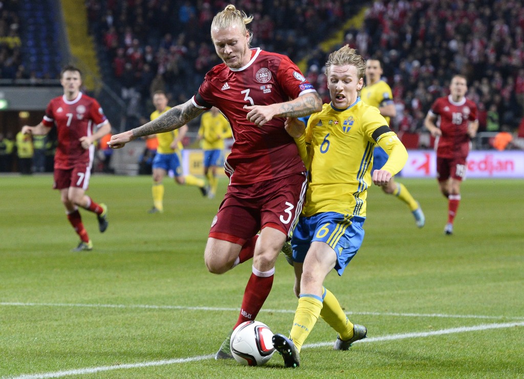 Sweden's midfielder Emil Forsberg (R) and Denmark's defender Simon Kjaer vie for the ball during the Euro 2016 play-off football match between Sweden and Denmark at the Friends arena in Solna on November 14, 2015. AFP PHOTO/JONATHAN NACKSTRAND (Photo credit should read JONATHAN NACKSTRAND/AFP/Getty Images)