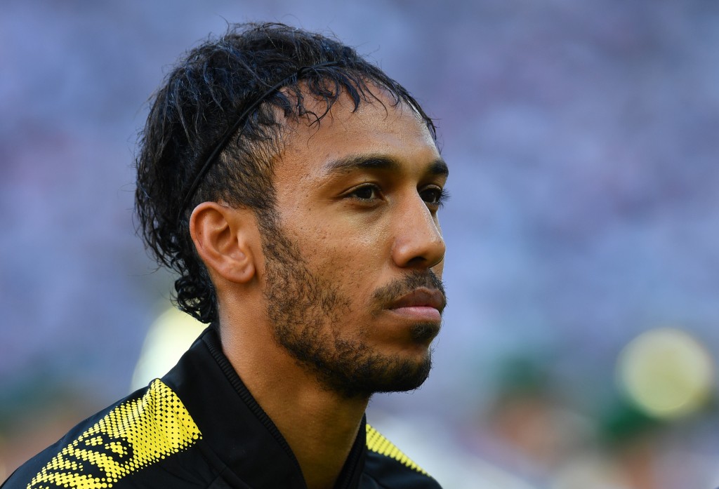 Dortmund's Gabonese forward Pierre-Emerick Aubameyang looks on prior the German Cup (DFB Pokal) final football match Eintracht Frankfurt v BVB Borussia Dortmund at the Olympic stadium in Berlin on May 27, 2017. / AFP PHOTO / Christof STACHE / RESTRICTIONS: ACCORDING TO DFB RULES IMAGE SEQUENCES TO SIMULATE VIDEO IS NOT ALLOWED DURING MATCH TIME. MOBILE (MMS) USE IS NOT ALLOWED DURING AND FOR FURTHER TWO HOURS AFTER THE MATCH. == RESTRICTED TO EDITORIAL USE == FOR MORE INFORMATION CONTACT DFB DIRECTLY AT +49 69 67880 / (Photo credit should read CHRISTOF STACHE/AFP/Getty Images)