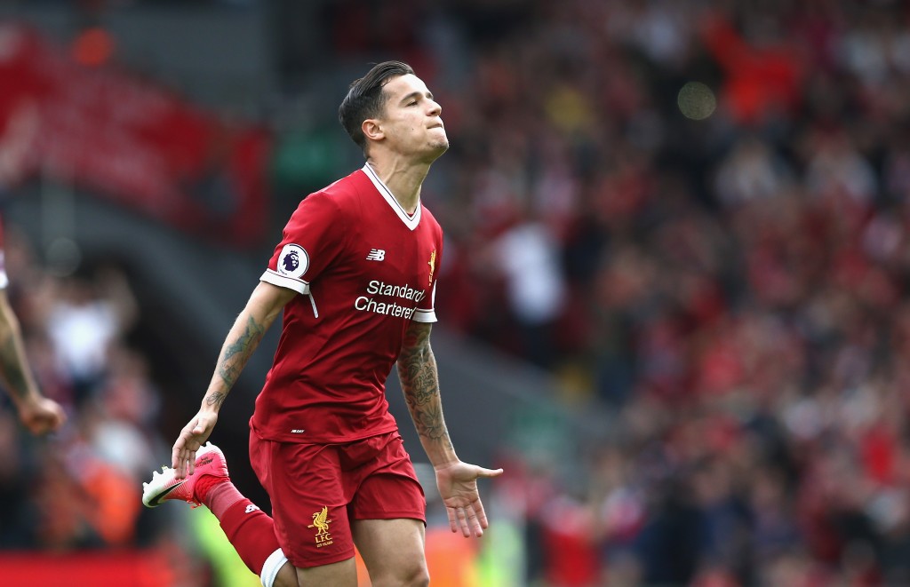 LIVERPOOL, ENGLAND - MAY 21: Philippe Coutinho of Liverpool celebrates scoring his sides second goal during the Premier League match between Liverpool and Middlesbrough at Anfield on May 21, 2017 in Liverpool, England. (Photo by Jan Kruger/Getty Images)