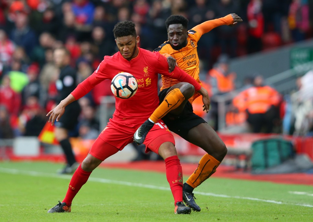 LIVERPOOL, ENGLAND - JANUARY 28: Joe Gomez of Liverpool and Nouha Dicko of Wolverhampton Wanderers compete for the ball during the Emirates FA Cup Fourth Round match between Liverpool and Wolverhampton Wanderers at Anfield on January 28, 2017 in Liverpool, England. (Photo by Alex Livesey/Getty Images)