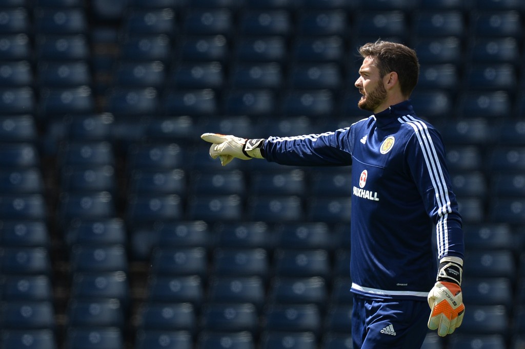It will be up to Gordon to direct the ball away from the Scotland goal. (Picture Courtesy - AFP/Getty Images)