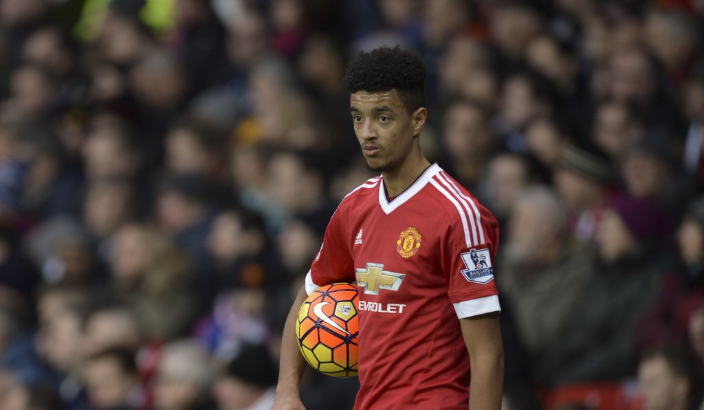 Manchester United's English defender Cameron Borthwick-Jackson prepares to take a throw in during the English Premier League football match between Manchester United and Southampton at Old Trafford in Manchester, north west England, on January 23, 2016. AFP PHOTO / OLI SCARFF RESTRICTED TO EDITORIAL USE. No use with unauthorized audio, video, data, fixture lists, club/league logos or 'live' services. Online in-match use limited to 75 images, no video emulation. No use in betting, games or single club/league/player publications. / AFP / OLI SCARFF (Photo credit should read OLI SCARFF/AFP/Getty Images)