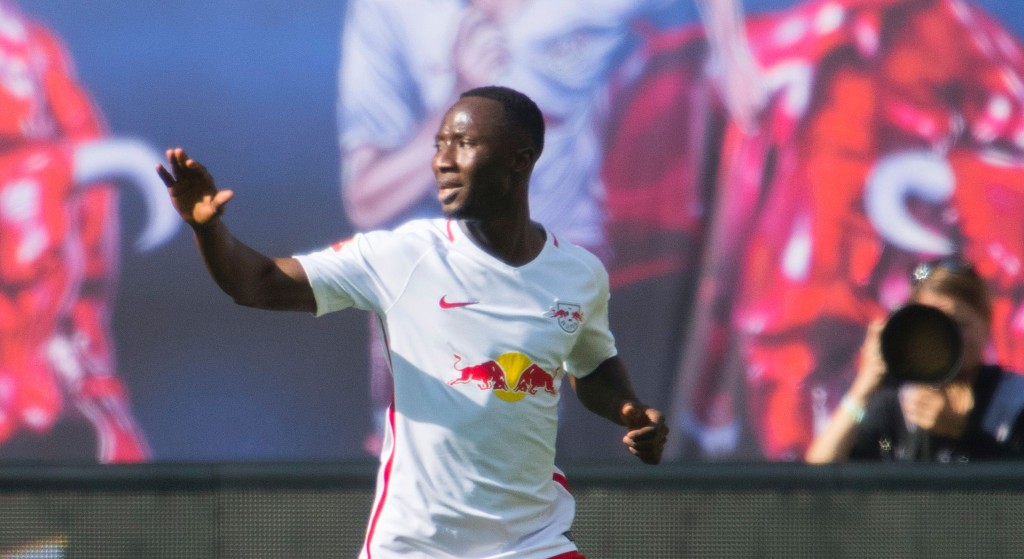 Leipzig's Guinean midfielder Naby Keita celebrates after scoring the 1-0 during the German First division Bundesliga football match between RB Leipzig and SV Darmstadt 98 in Leipzig, on April 1, 2017. / AFP PHOTO / ROBERT MICHAEL / RESTRICTIONS: DURING MATCH TIME: DFL RULES TO LIMIT THE ONLINE USAGE TO 15 PICTURES PER MATCH AND FORBID IMAGE SEQUENCES TO SIMULATE VIDEO. == RESTRICTED TO EDITORIAL USE == FOR FURTHER QUERIES PLEASE CONTACT DFL DIRECTLY AT + 49 69 650050 (Photo credit should read ROBERT MICHAEL/AFP/Getty Images)