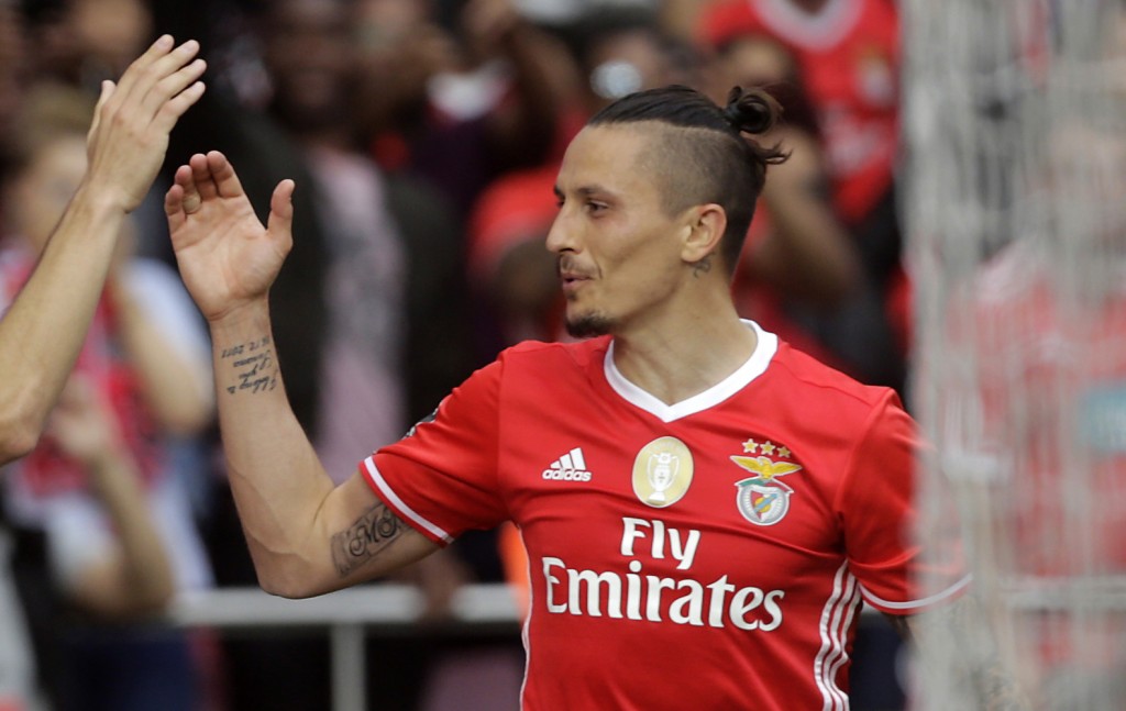 Benfica's forward Pizzi (L) celebrates his goal with Serbian midfielder Ljubomir Fejsa during the Portuguese league football match SL Benfica vs Vitoria Guimaraes SC at the Luz stadium in Lisbon on May 13, 2017. / AFP PHOTO / JOSE MANUEL RIBEIRO (Photo credit should read JOSE MANUEL RIBEIRO/AFP/Getty Images)