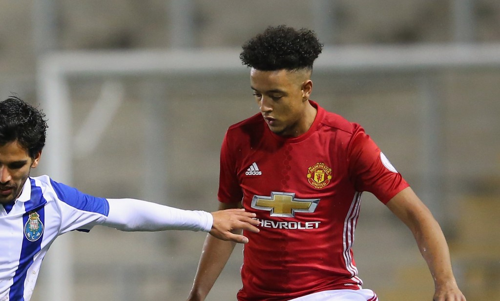 LEIGH, GREATER MANCHESTER - FEBRUARY 22: Joao Graca of Porto holds off a challenge from Regan Poole and Cameron Borthwick-Jackson of Manchester United during the Premier League International Cup Quarter Final match between Manchester United U23 and Porto B at Leigh Sports Village on February 22, 2017 in Leigh, Greater Manchester. (Photo by Alex Livesey/Getty Images)