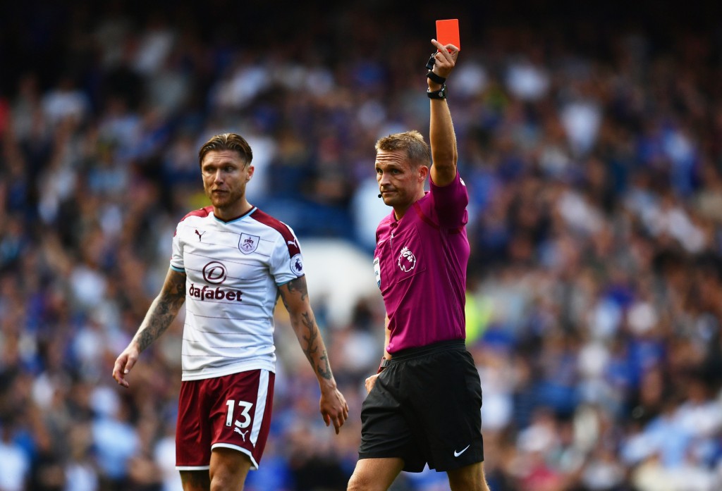 LONDON, ENGLAND - AUGUST 12: Referee Craig Pawson shows Cesc Fabregas of Chelsea (not pictured) a red card during the Premier League match between Chelsea and Burnley at Stamford Bridge on August 12, 2017 in London, England. (Photo by Dan Mullan/Getty Images)